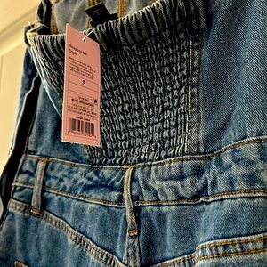 Brand New with tags Ladies Jean Jumper, Side Zip Closure. Cargo pockets. Cute SM